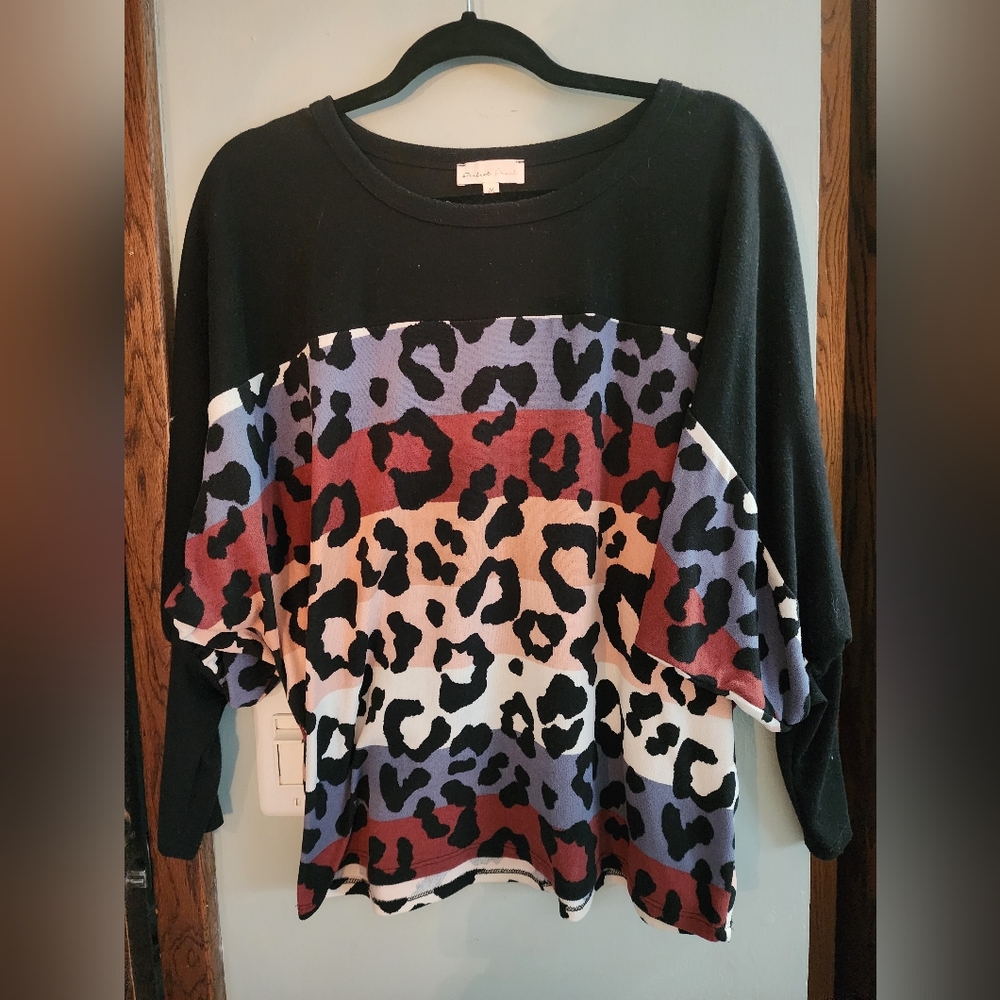 EUC leopard striped sweater